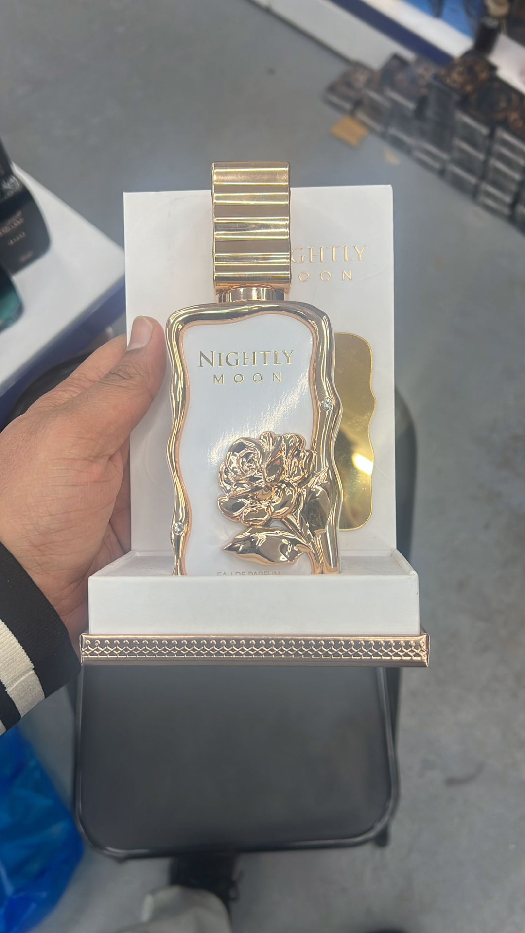 Nightly Moon white and gold eau de parfum bottle in its presentation box